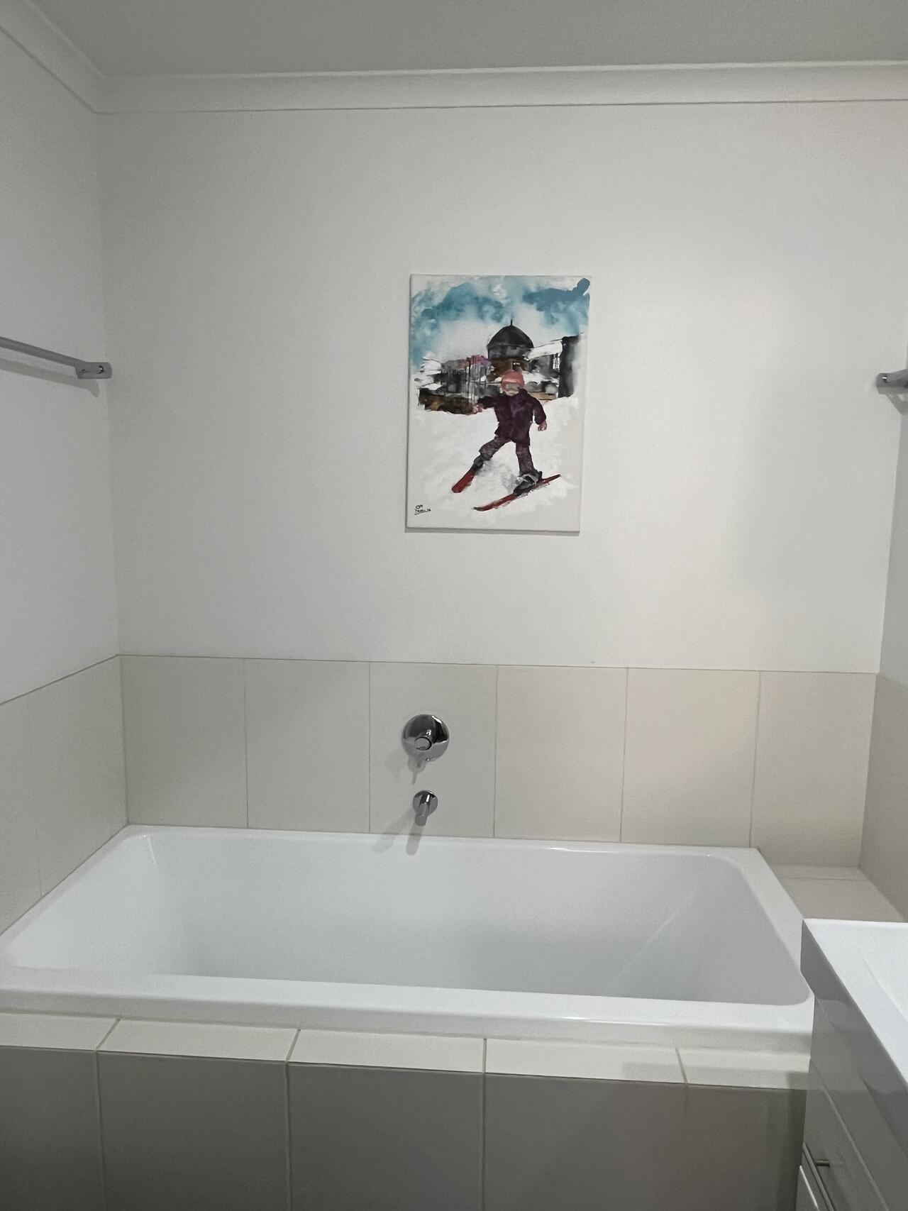 Bathroom with a deep soaking bath