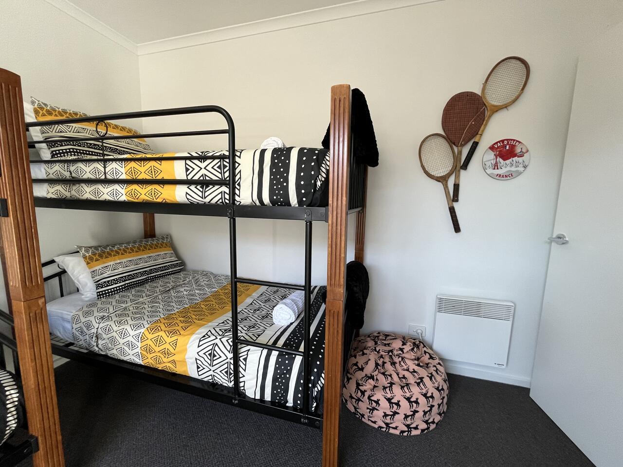 Bunk room with two sets of bunks