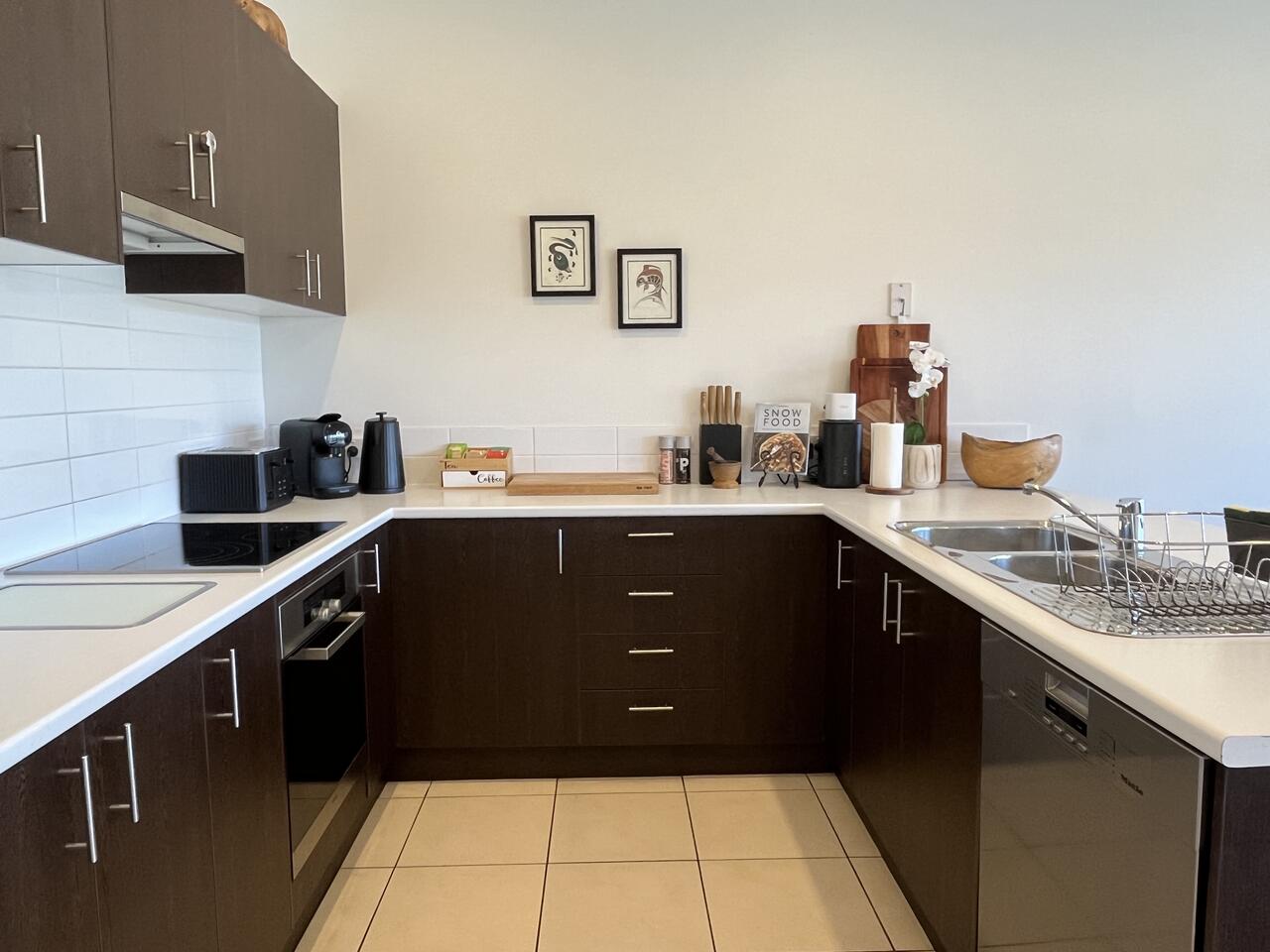 Full kitchen with dishwasher and oven