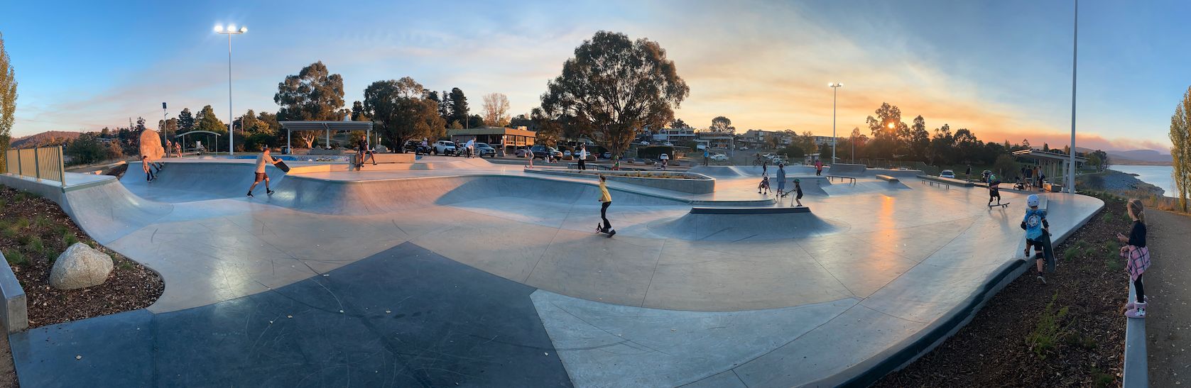 Jindabyne skate park at sunset, with Lake Jindabyne in the background